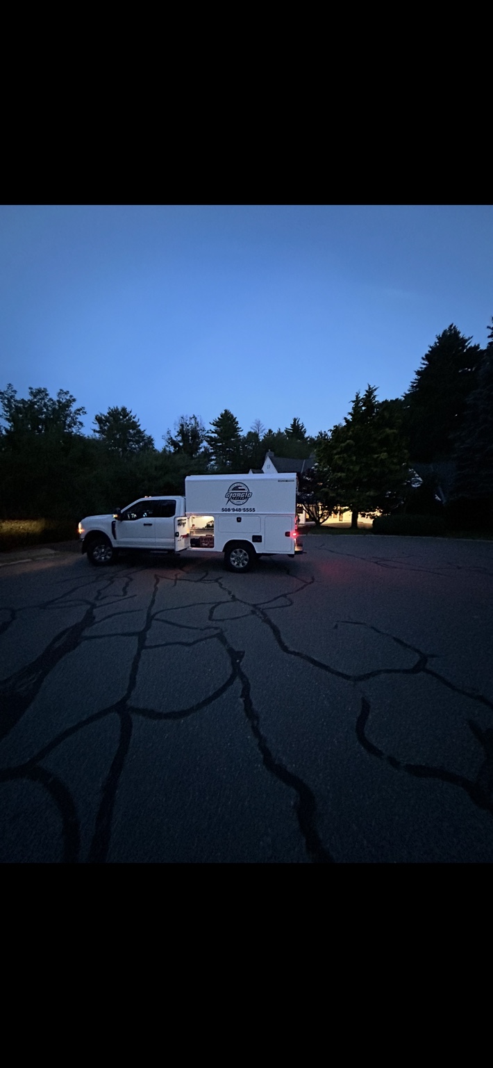 Giorgio Electric service truck on a jobsite at dusk